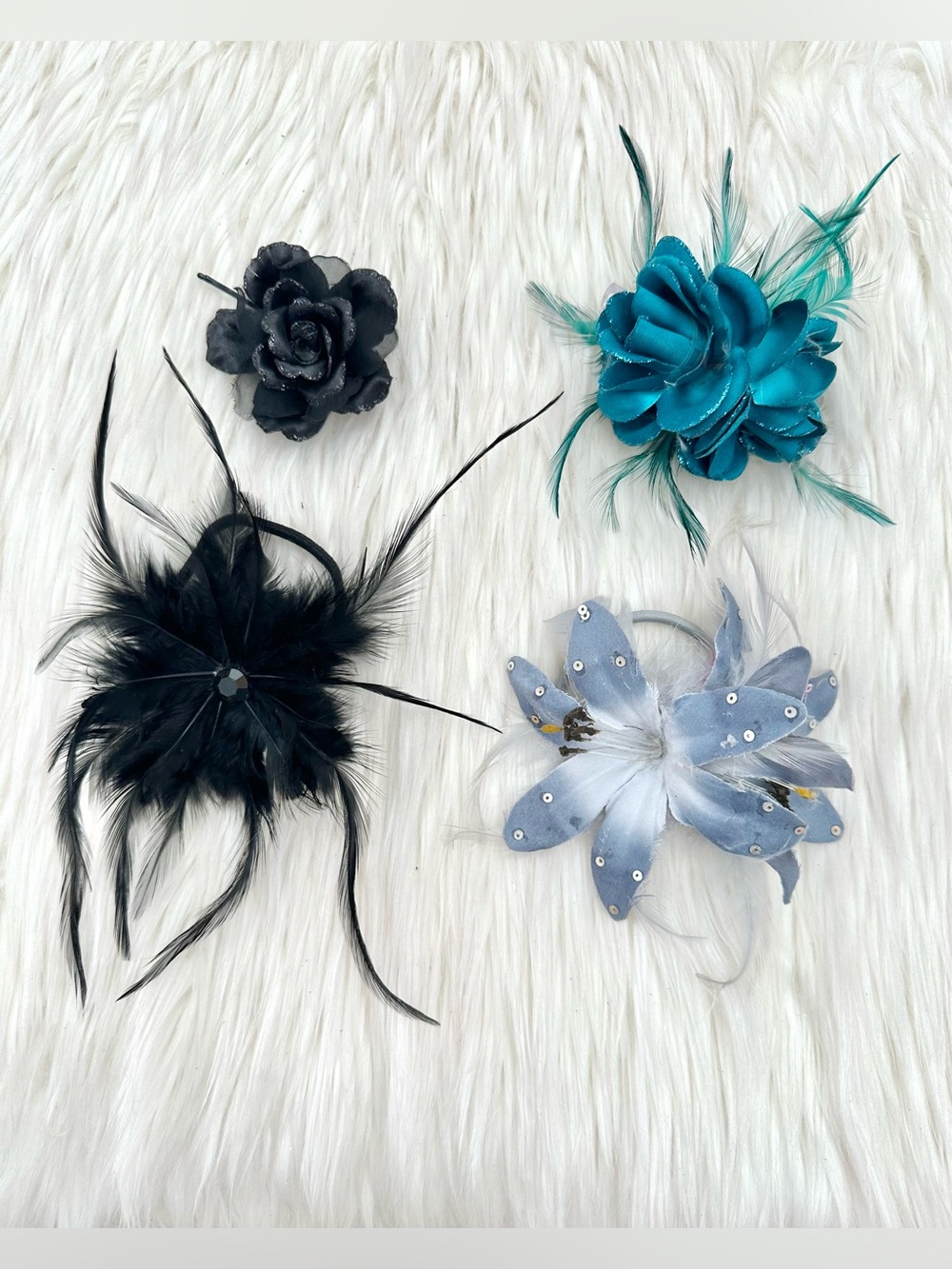 CLAIRES BLACK FLOWER CILPS